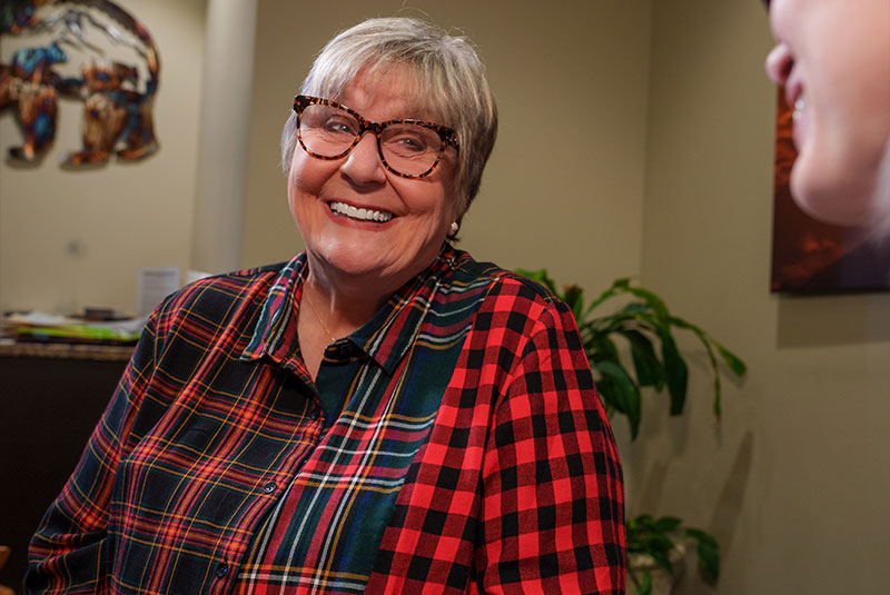 patient smiling at Team member