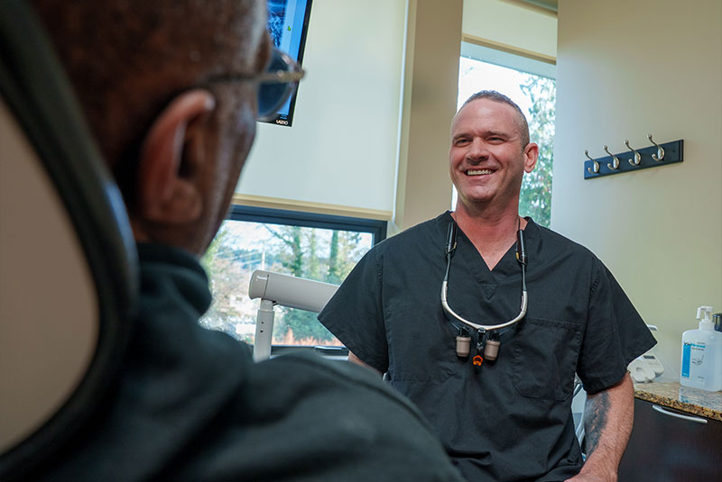 Doctor Smiling at Patient