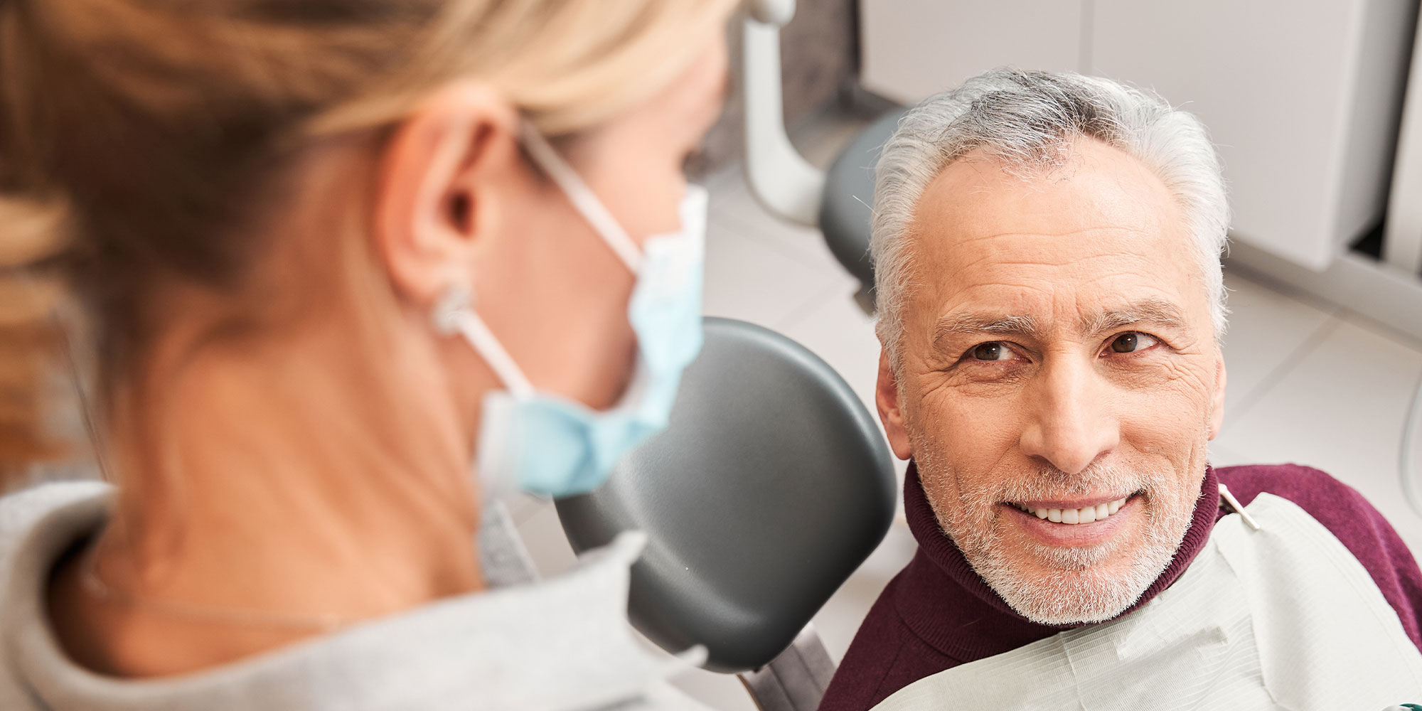 Older man getting fitted for dentures