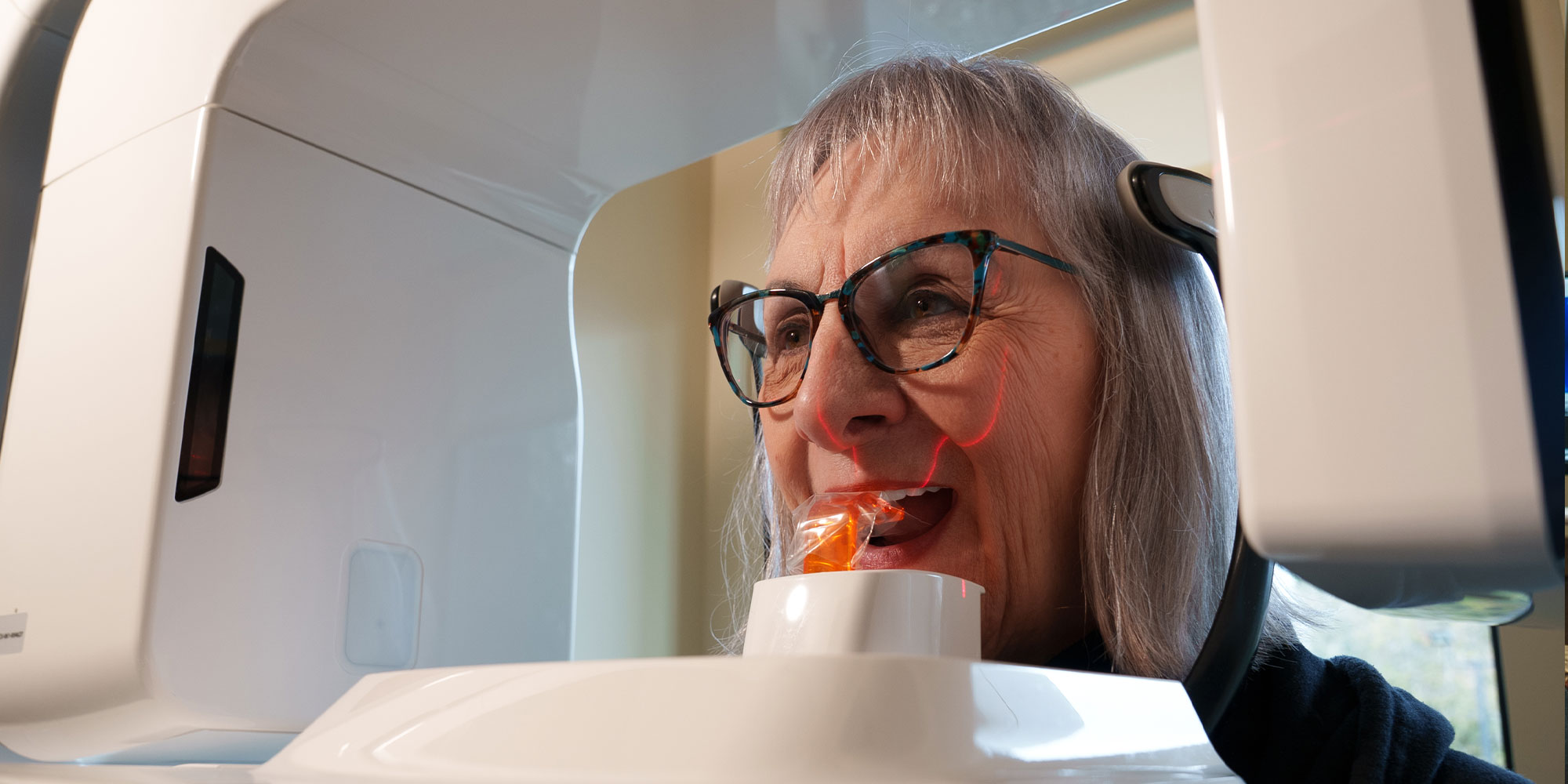 Patient taking a dental x-ray